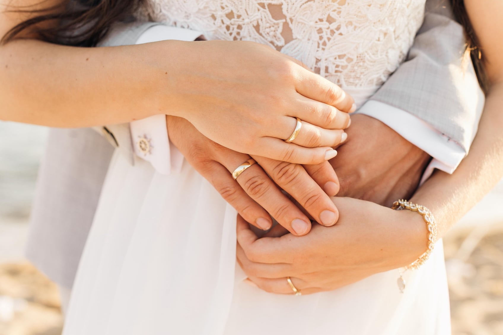 groom bride hands